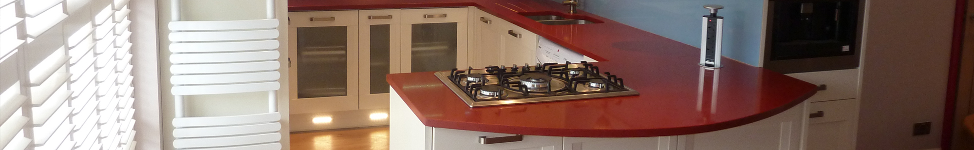 kitchen with red worktops